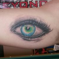 Above and Beyond Tattoo Studio